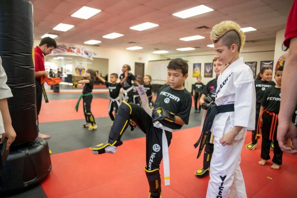 Boys Practicing Kicking During the Children's karate Classes at Victory Martial Arts in Clermont, Florida