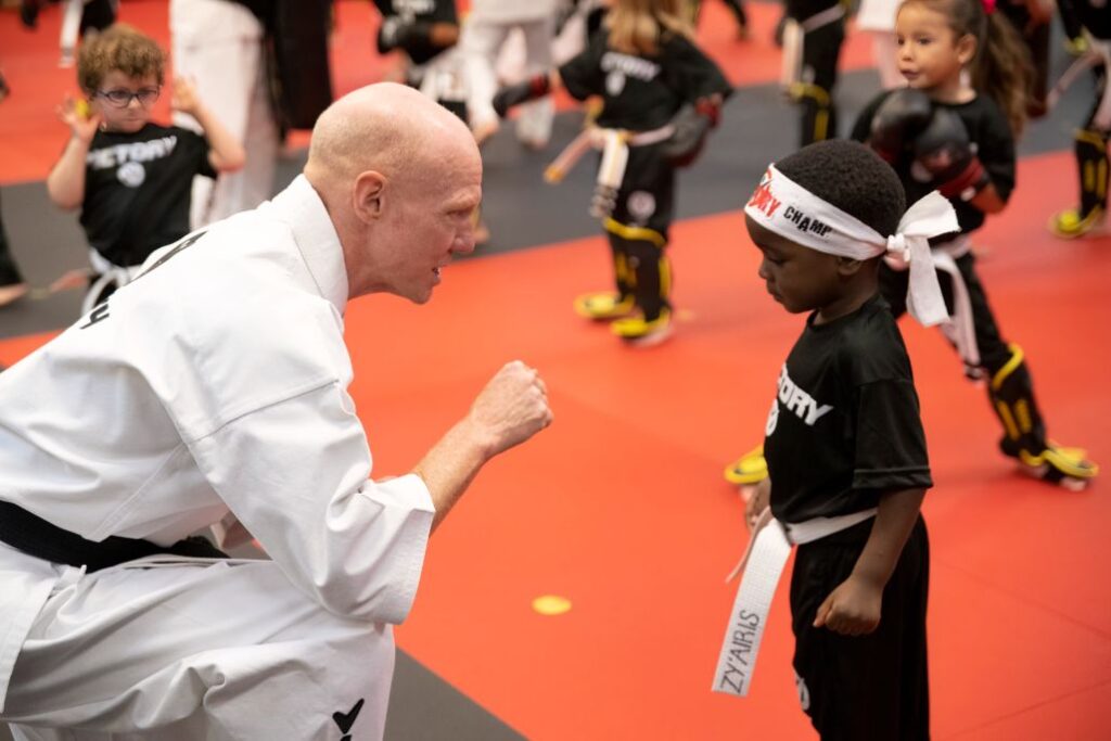 Martial Arts Instructor Showing the Correct Way to Clench His Fist at Victory MA at Lakewood, Lee's Summit, MO