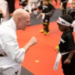 Martial Arts Instructor Showing the Correct Way to Clench His Fist at Victory MA at Lakewood, Lee's Summit, MO