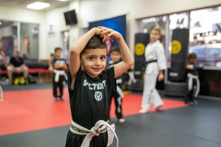 Boy Looking at the Camera While Enjoying Kids Karate Training in Boca Park